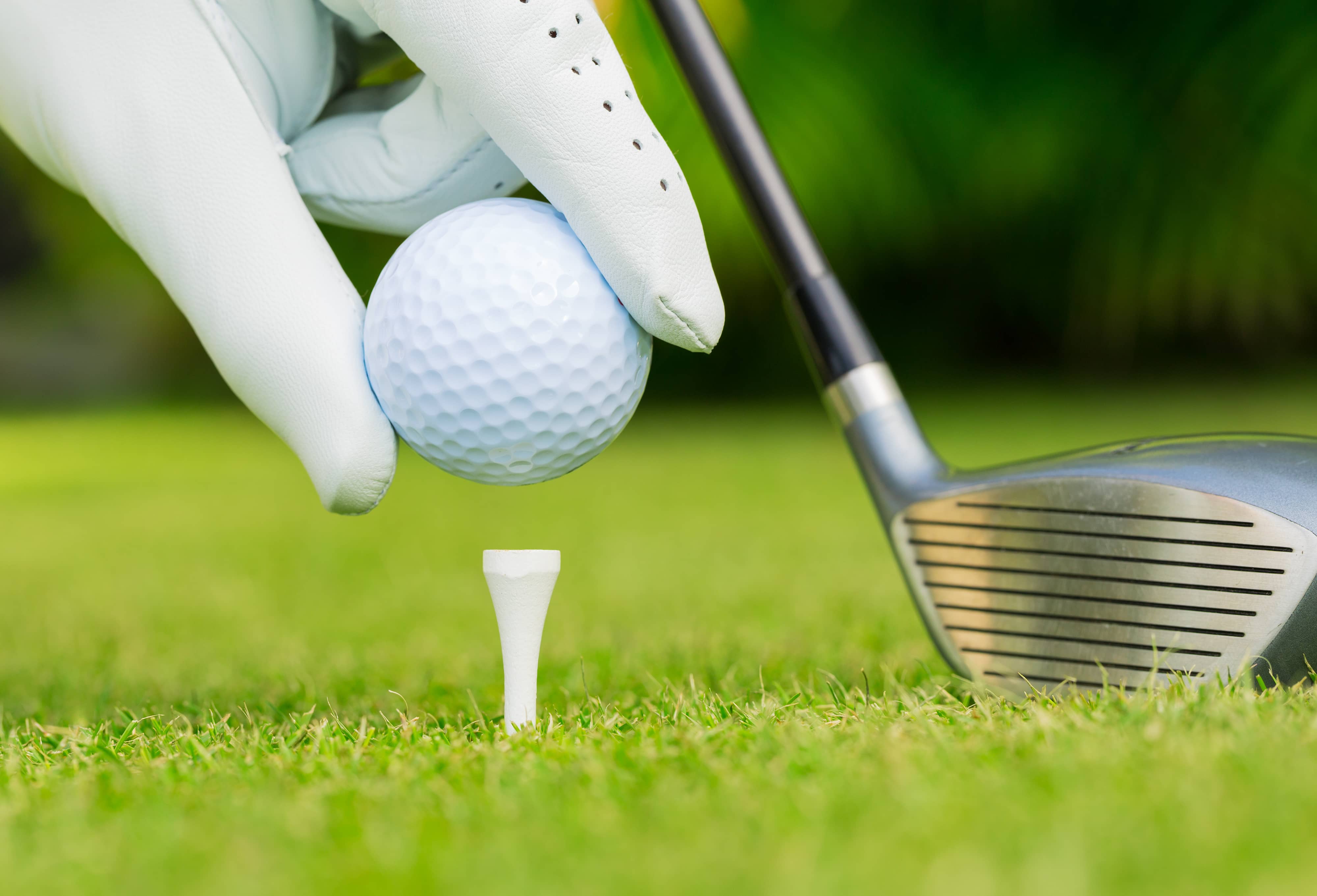 close-up-view-of-golf-ball-on-tee-on-golf-course