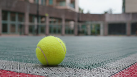 tennis-ball-on-a-tennis-court