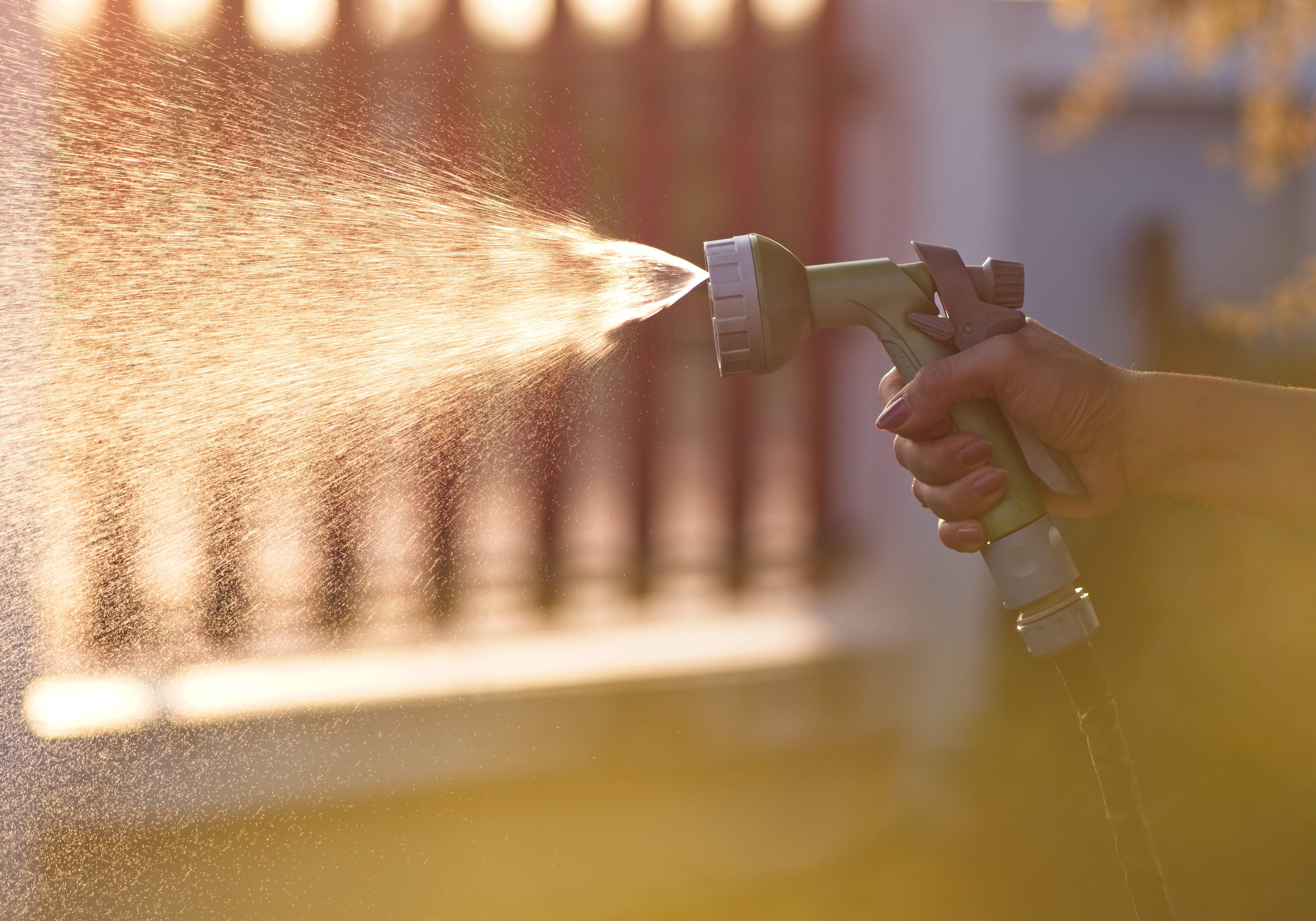 water-spray-from-watering-in-the-garden-2021-08-26-19-59-00-utc