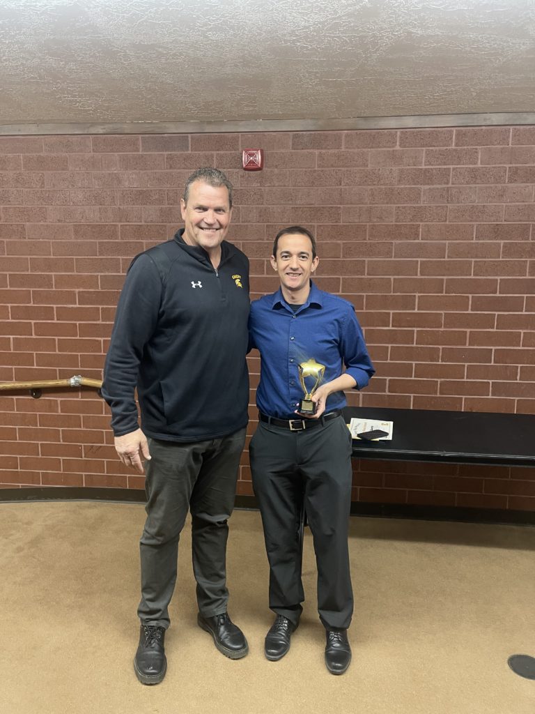 Emery High School Helping Hands Award given to Drive Time Sports