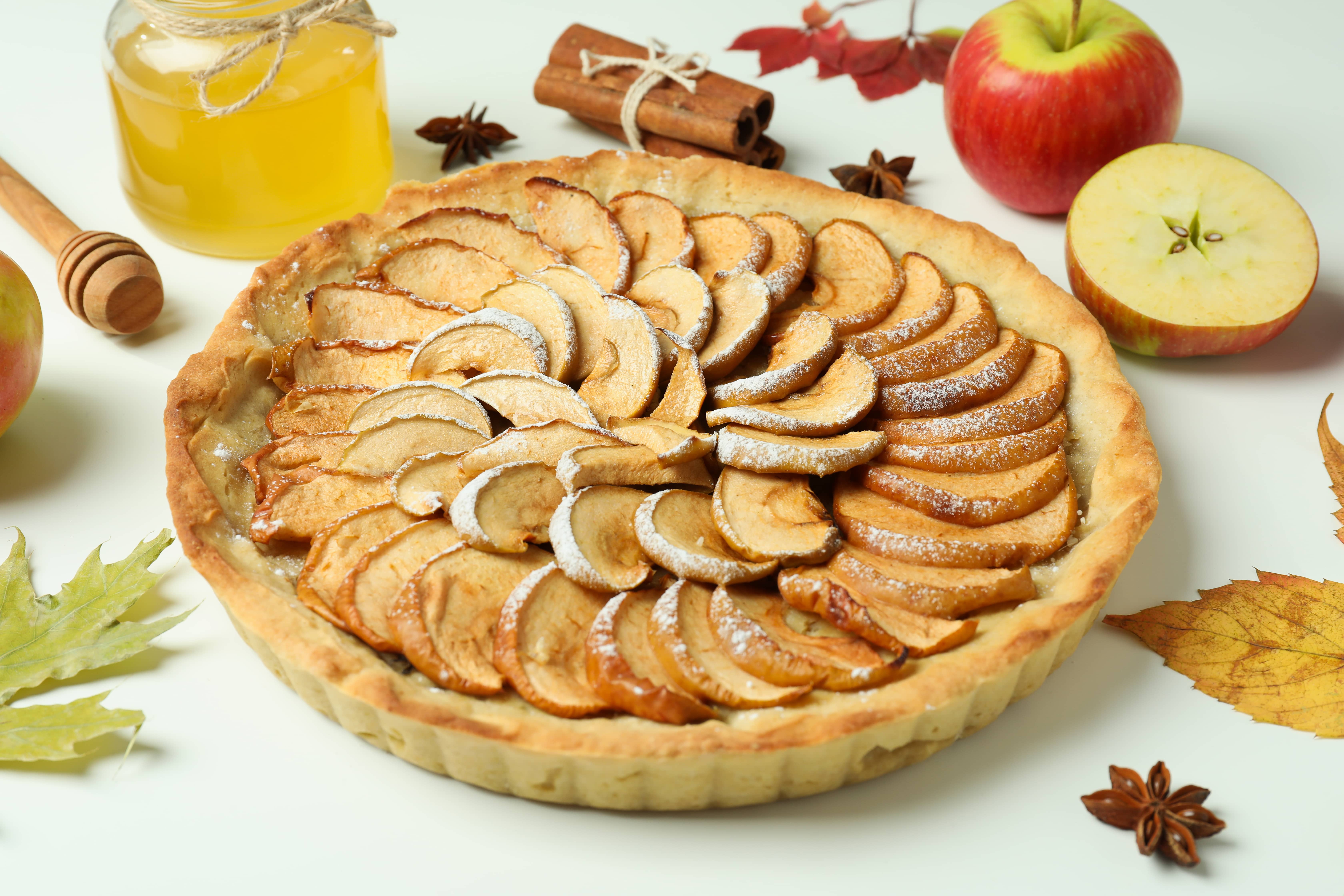 concept-of-tasty-food-with-apple-pie-on-white-background