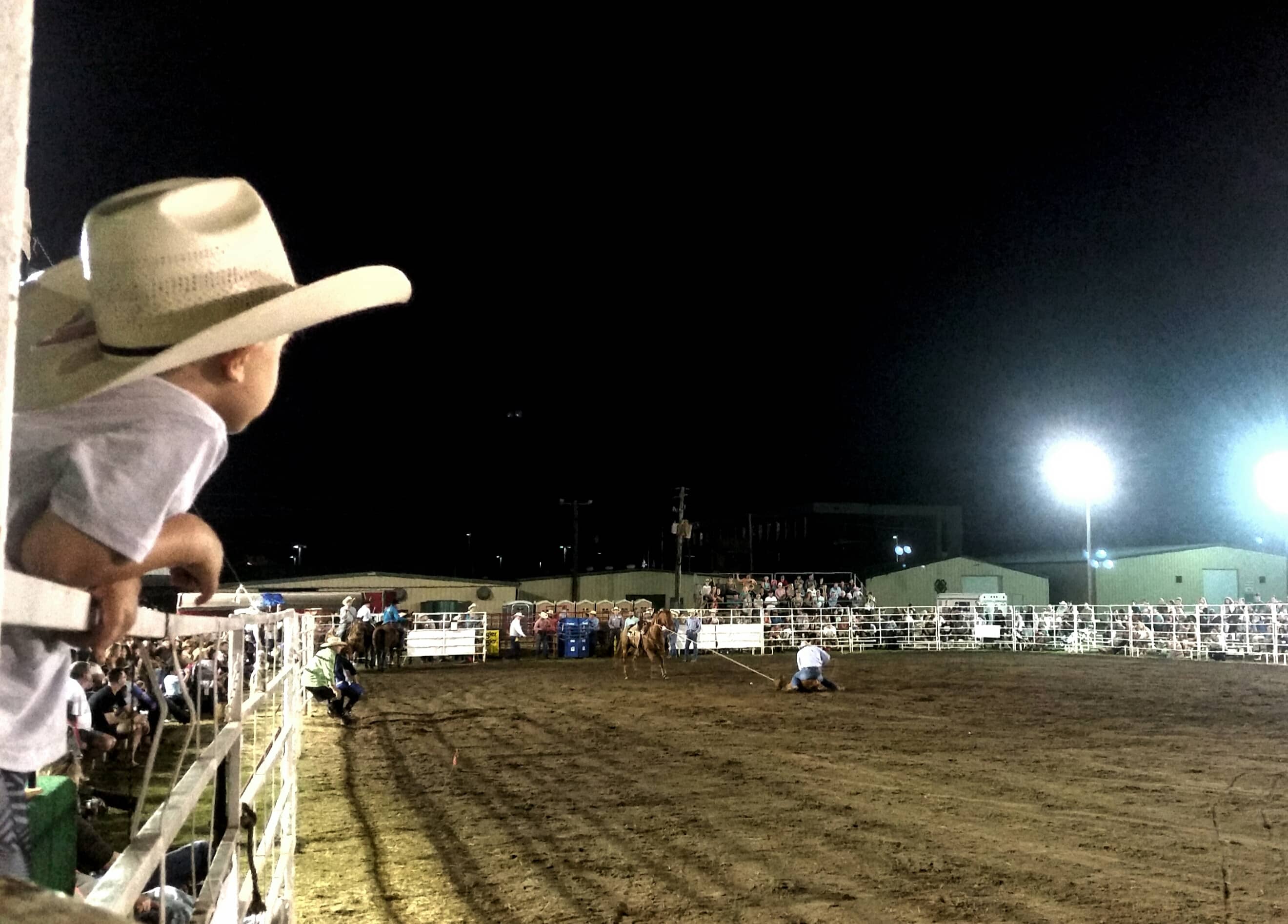 little-cowboy-watching-rodeo-in-his-future-with-bi-2021-12-22-00-54-34-utc