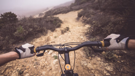 downhill-pov-view-with-mountain-bike