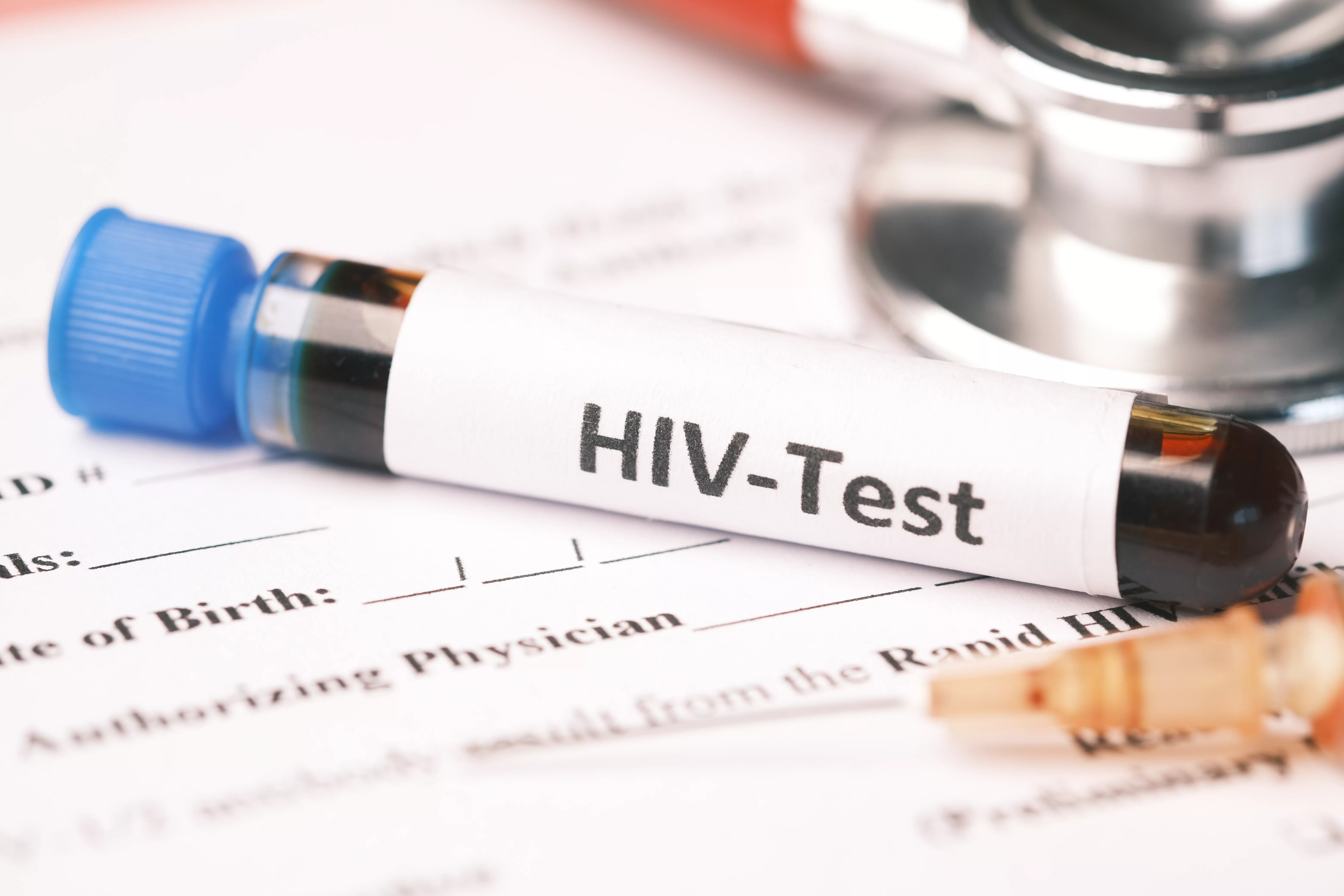 hiv-blood-test-tube-and-prescription-on-table