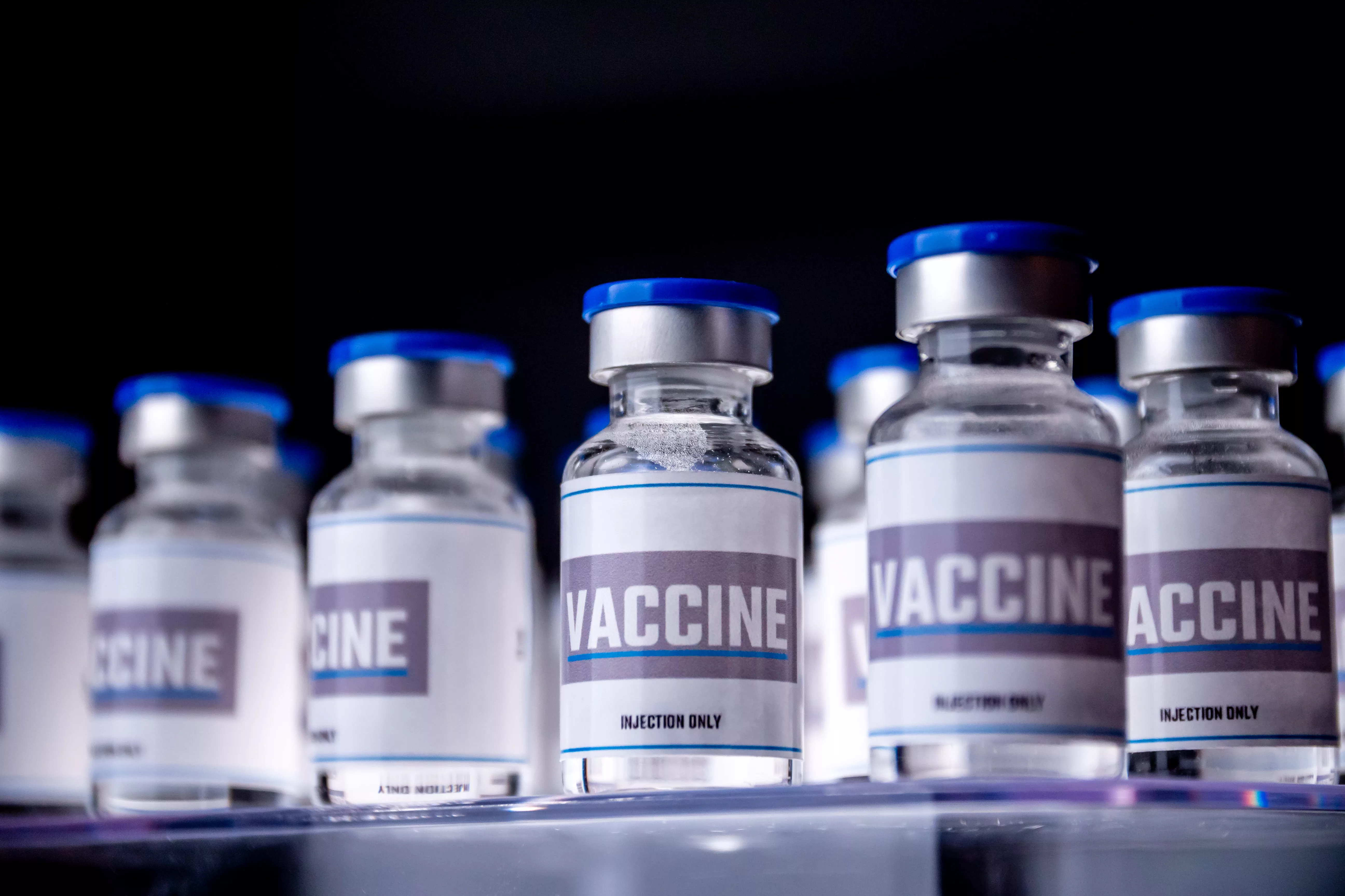 glass-vials-for-vaccine-in-laboratory-group-of-vaccine-bottles