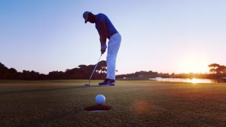 golfer-hitting-shot-at-golf-course-2