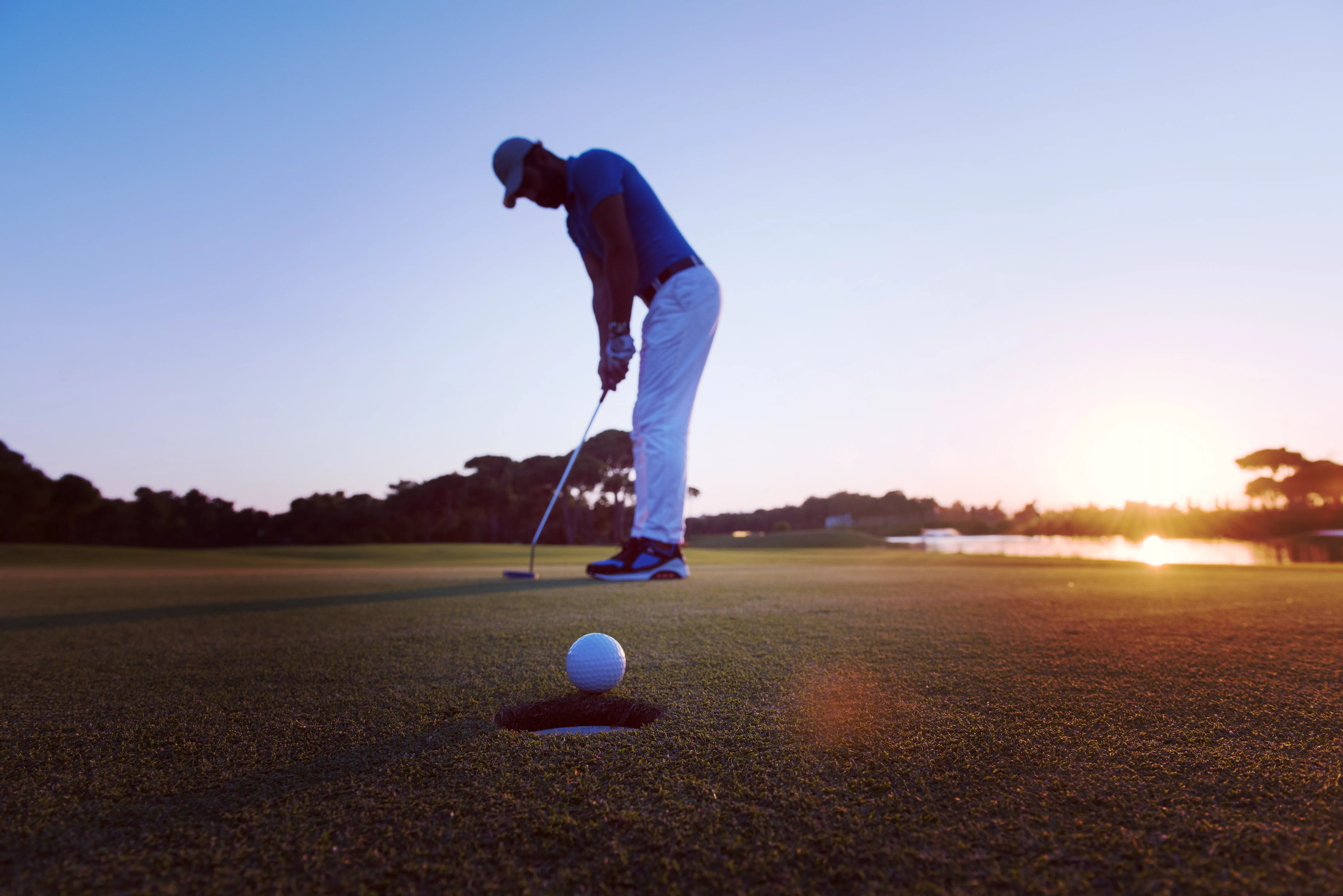 golfer-hitting-shot-at-golf-course-2