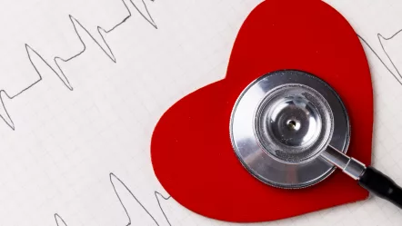 image-of-red-heart-and-stethoscope-on-white-surface-with-heart-rate-health-medicine-prevention-and-heart-illnesses-awareness-concept