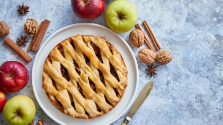 fresh-baked-tasty-homemade-apple-pie-cake-with-ingredients-on-side