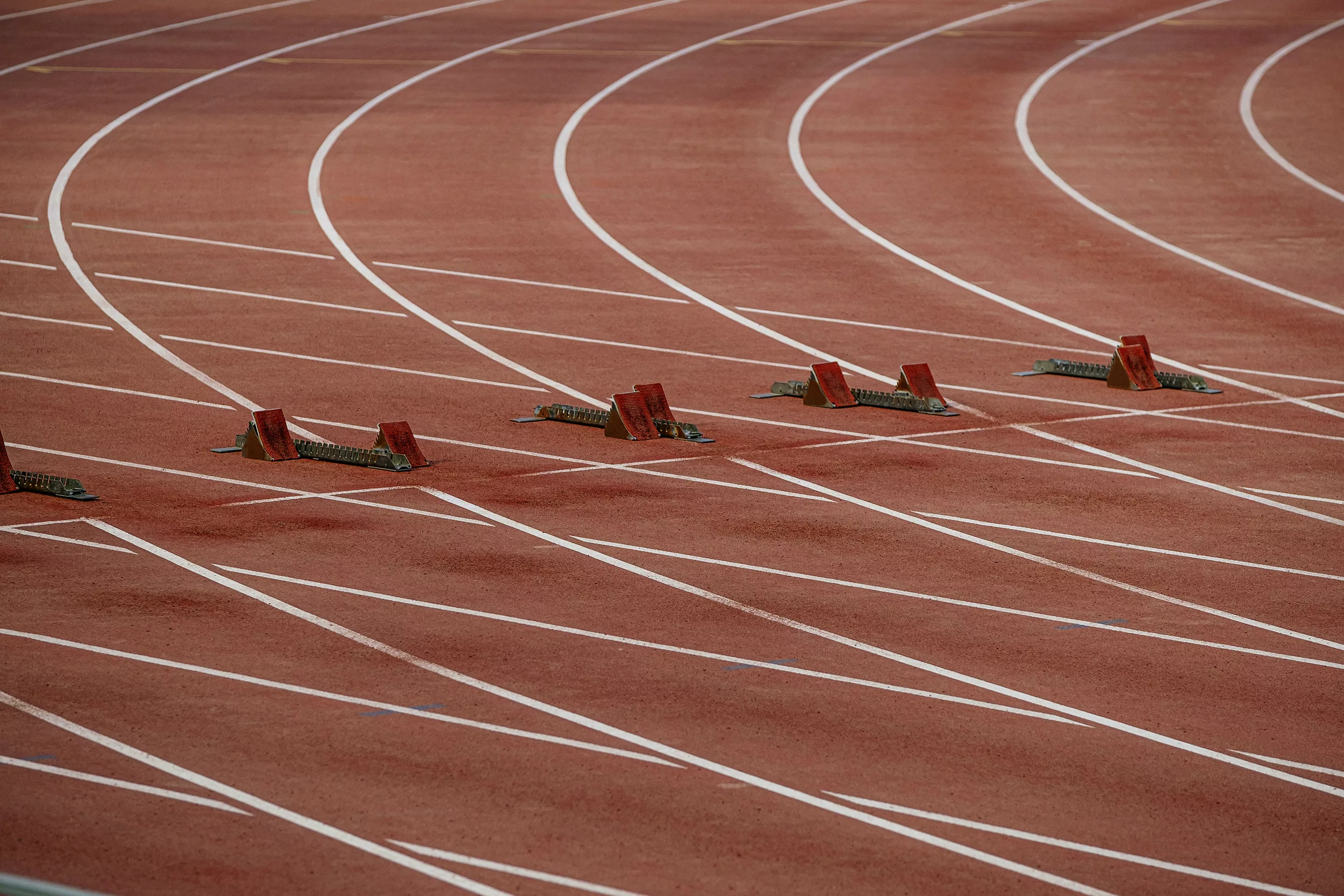 starting-blocks-on-start-line-of-100-meters-race