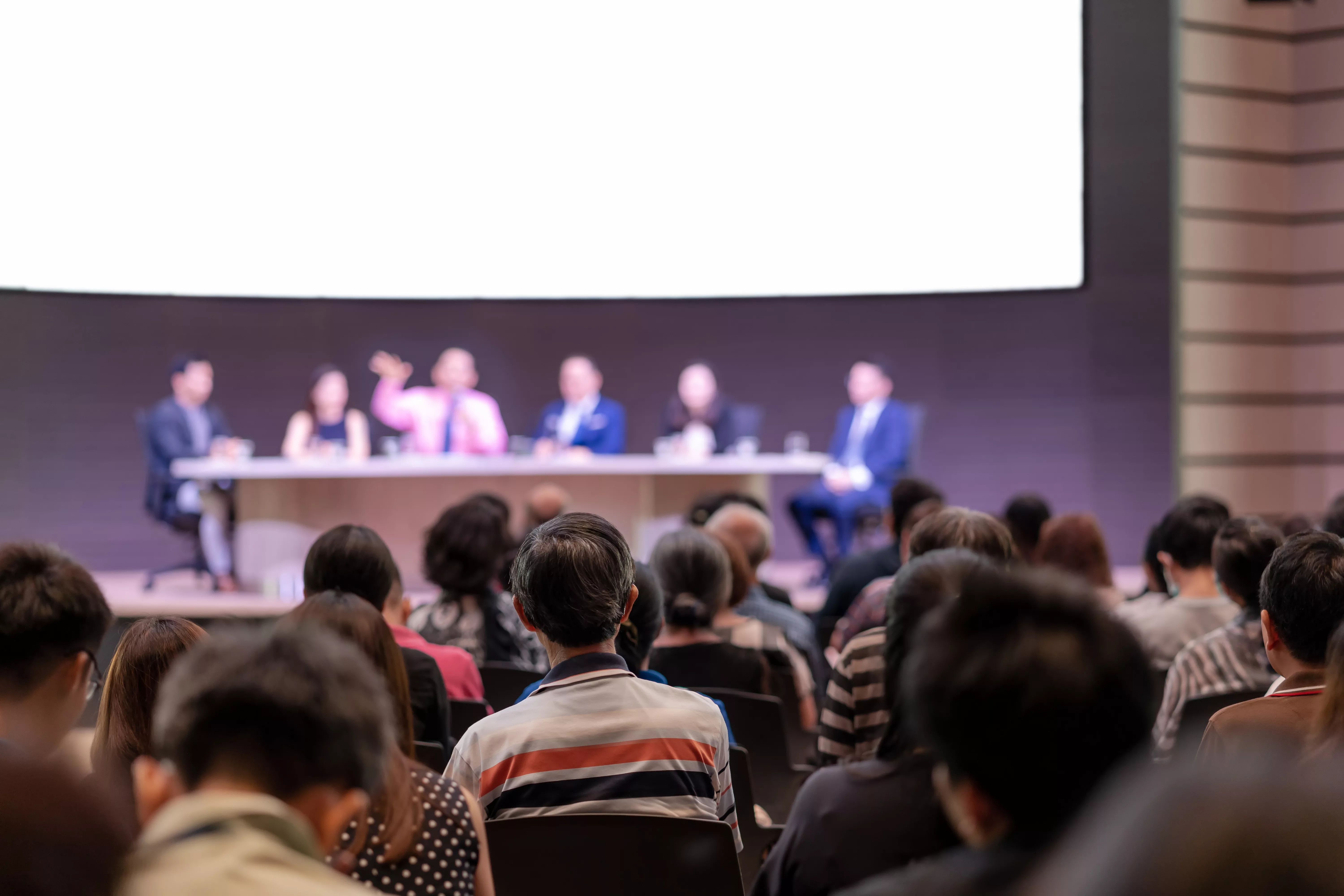 rear-view-of-audience-in-the-conference-hall-or-seminar-meeting