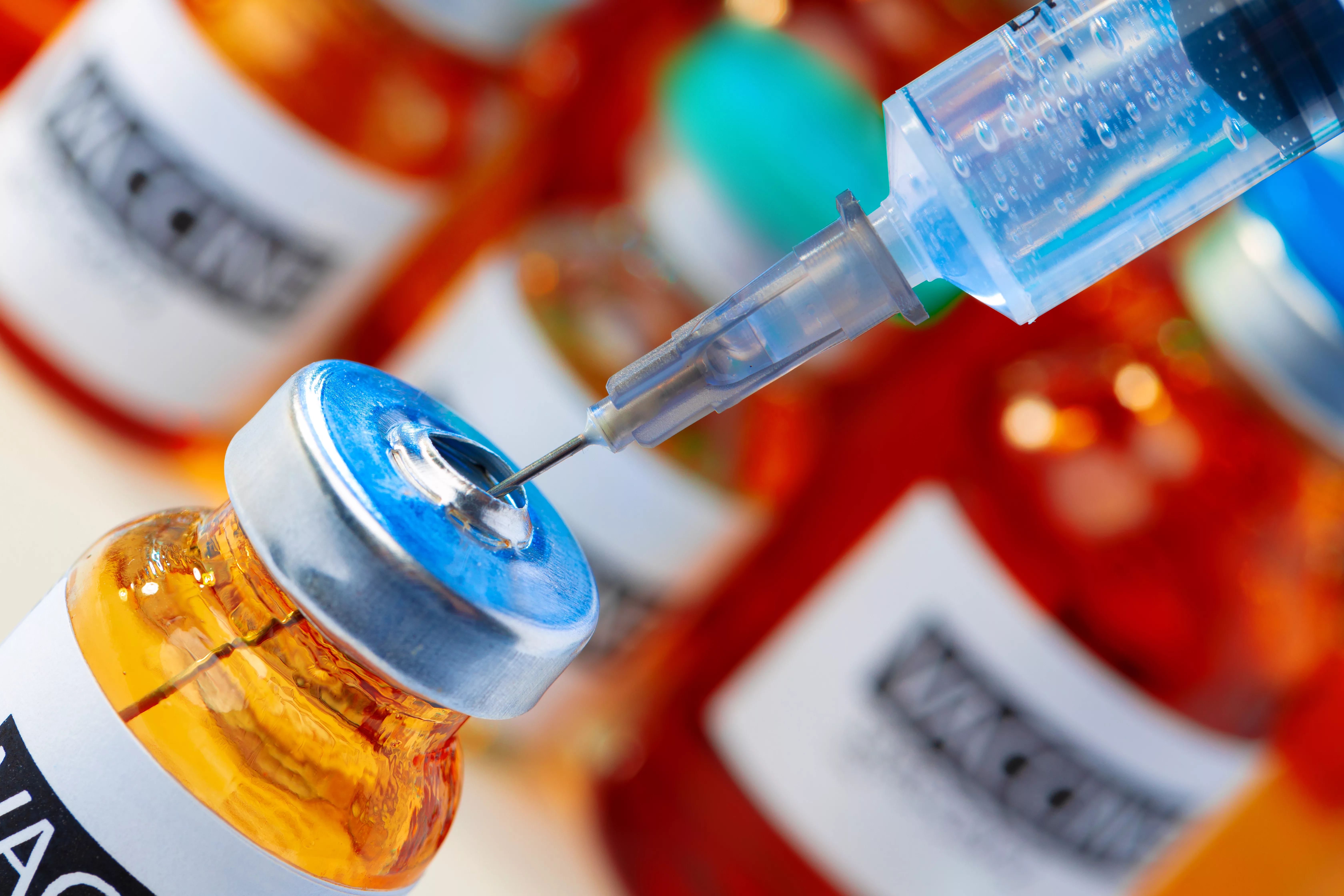 medical-vial-with-medication-and-syringe-close-up