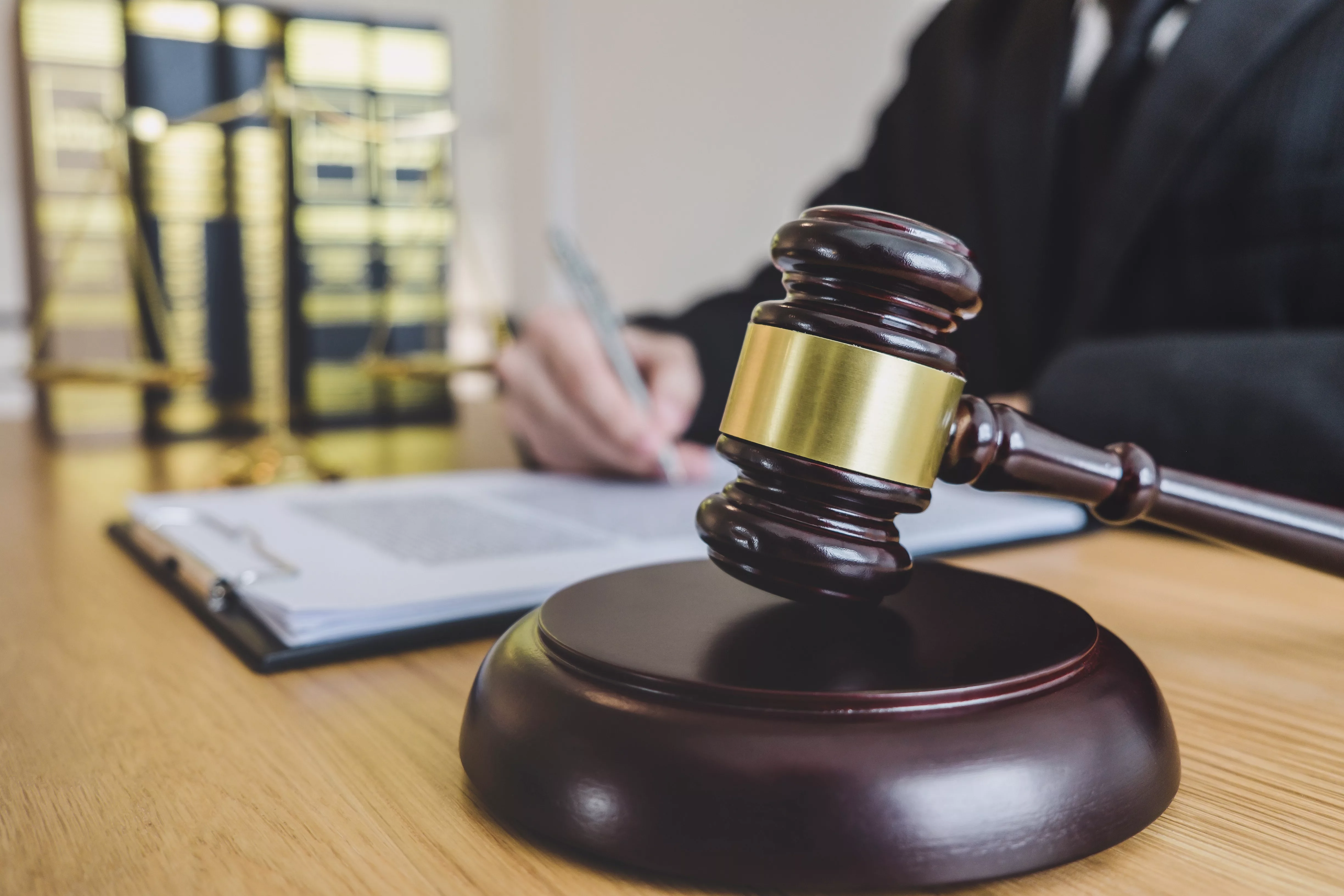 judge-gavel-with-scales-of-justice-professional-male-lawyers-or