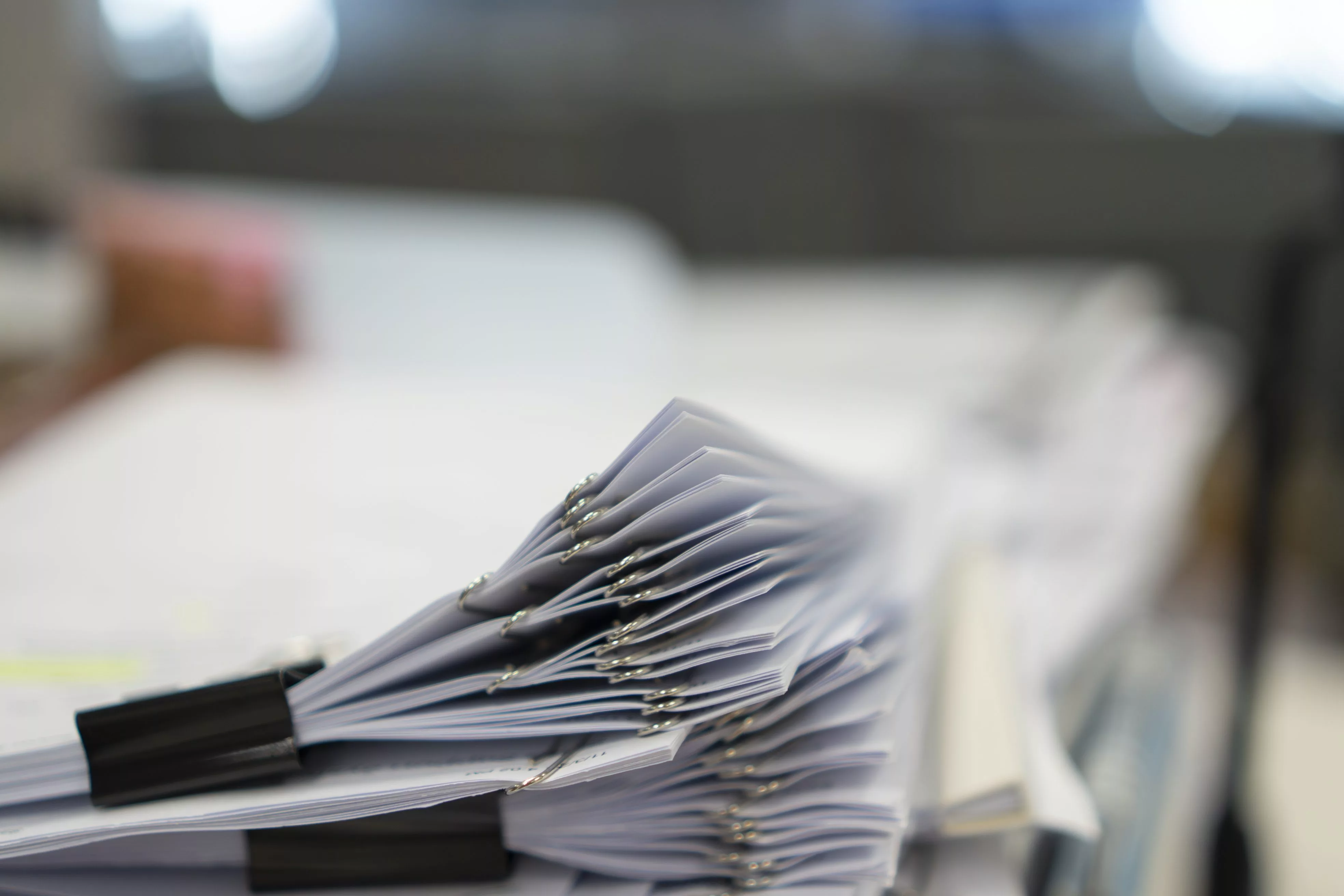 stack-of-paper-document-many-jobs-waiting-to-be-done-on-the-ta