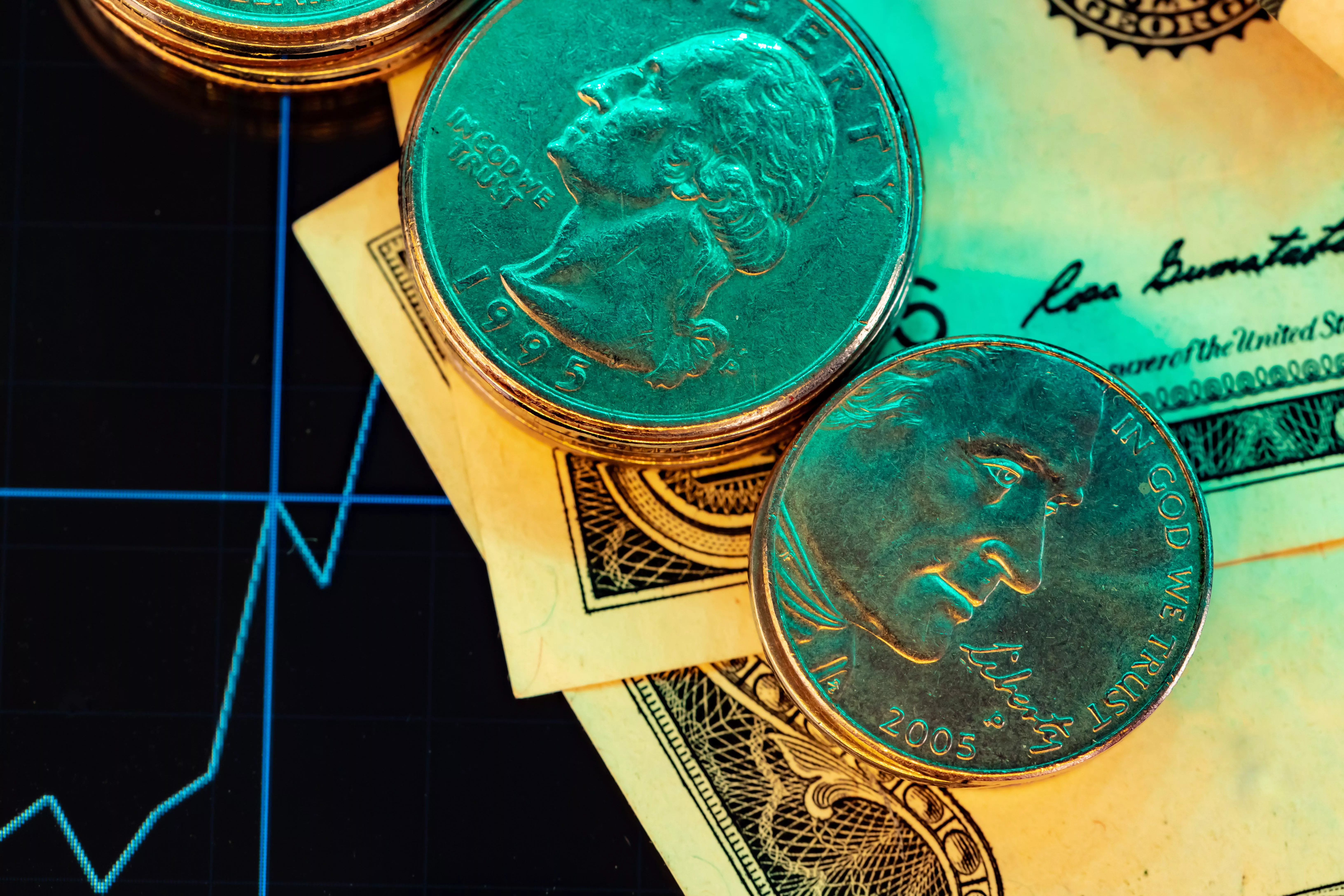 american-dollar-banknotes-and-graph-on-black-background
