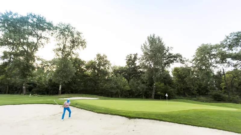 young-man-playing-golf