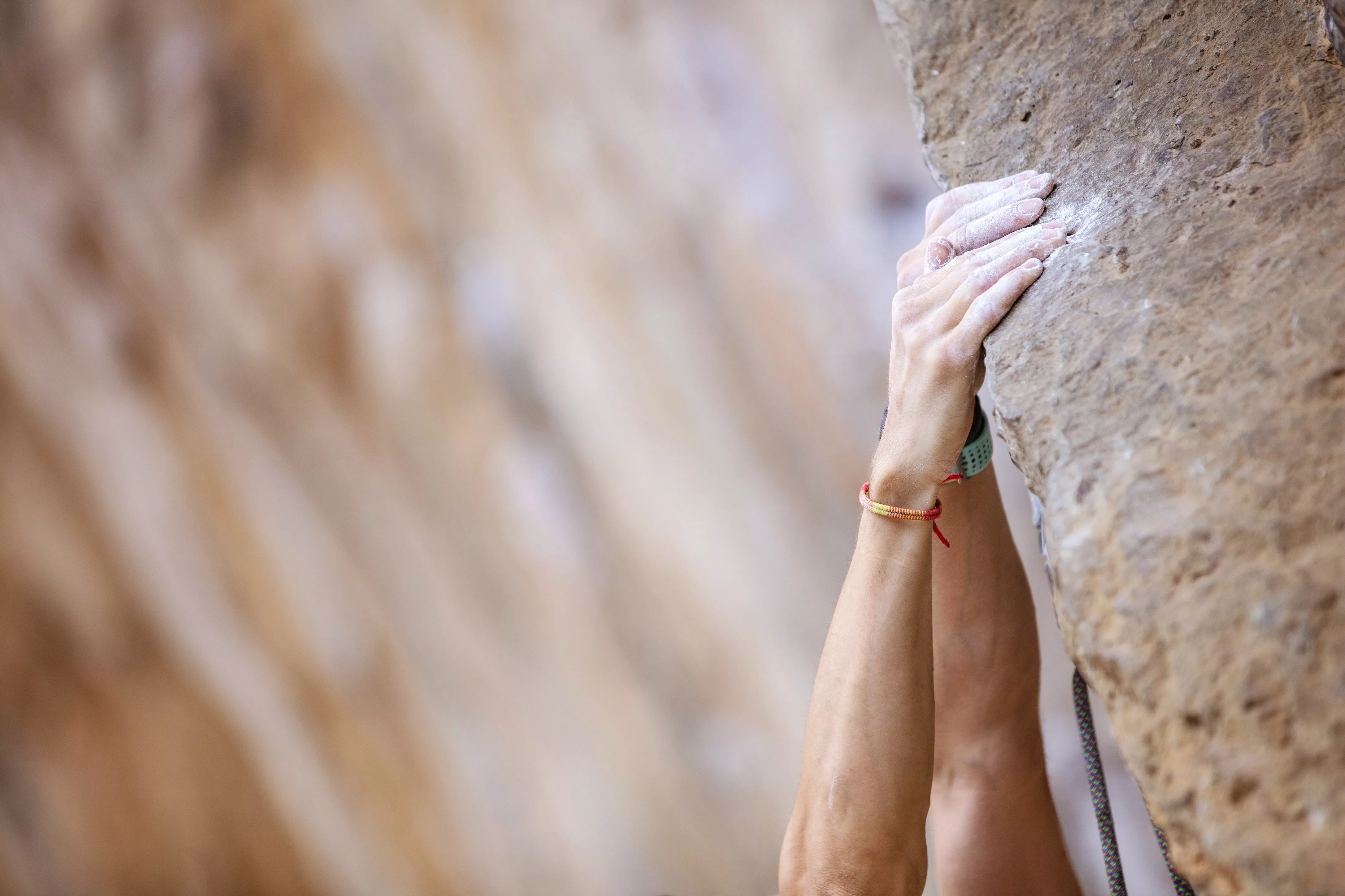 close-up-climber-s-hands-on-a-cliff-2025-01-09-06-16-18-utc