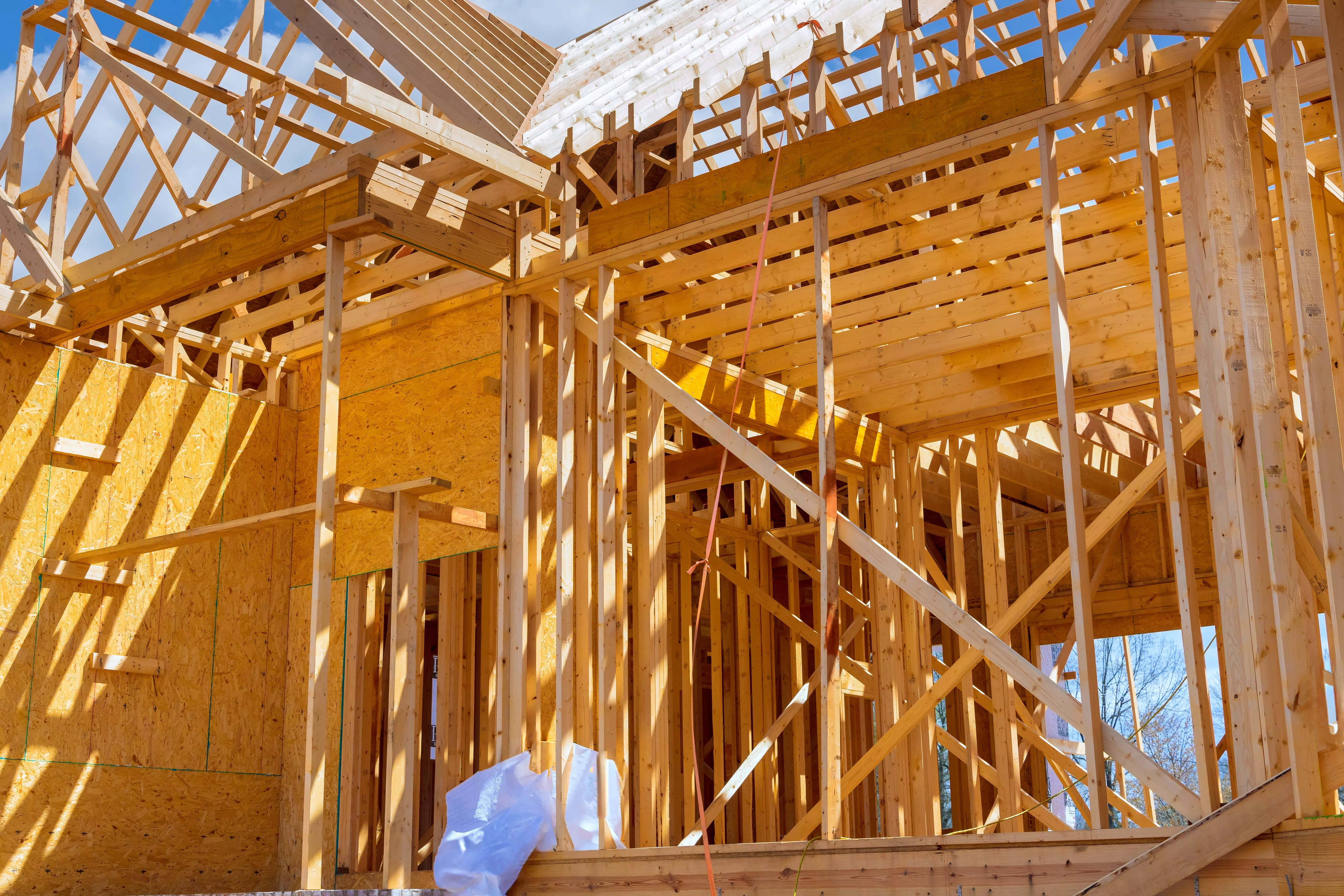 framing-beams-at-wooden-framework-construction-of-new-house-under-construction-a-home