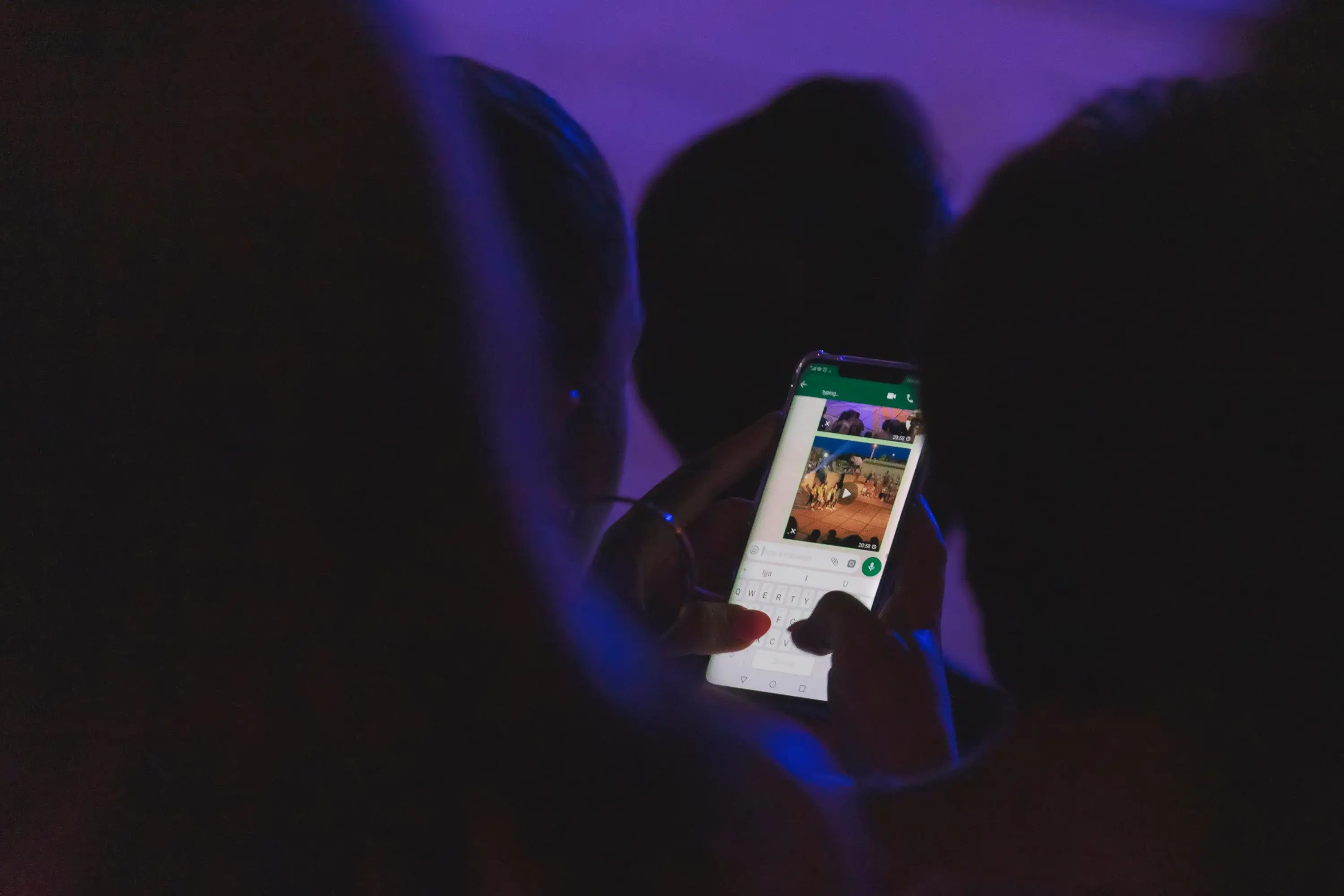 closeup-device-display-in-woman-hands-and-chatting-2025-01-09-15-35-29-utc