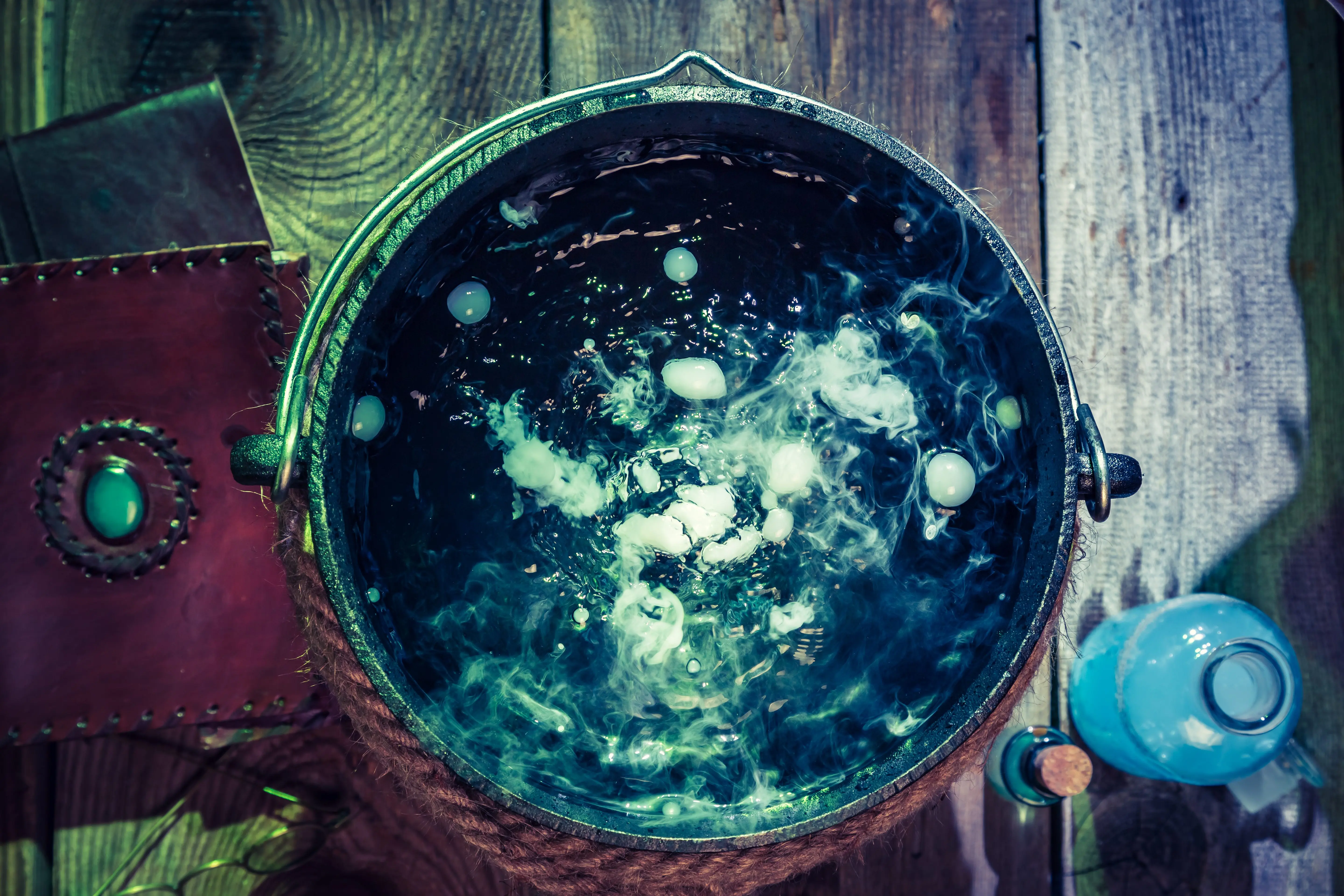 closeup-of-witcher-cauldron-with-books-for-halloween