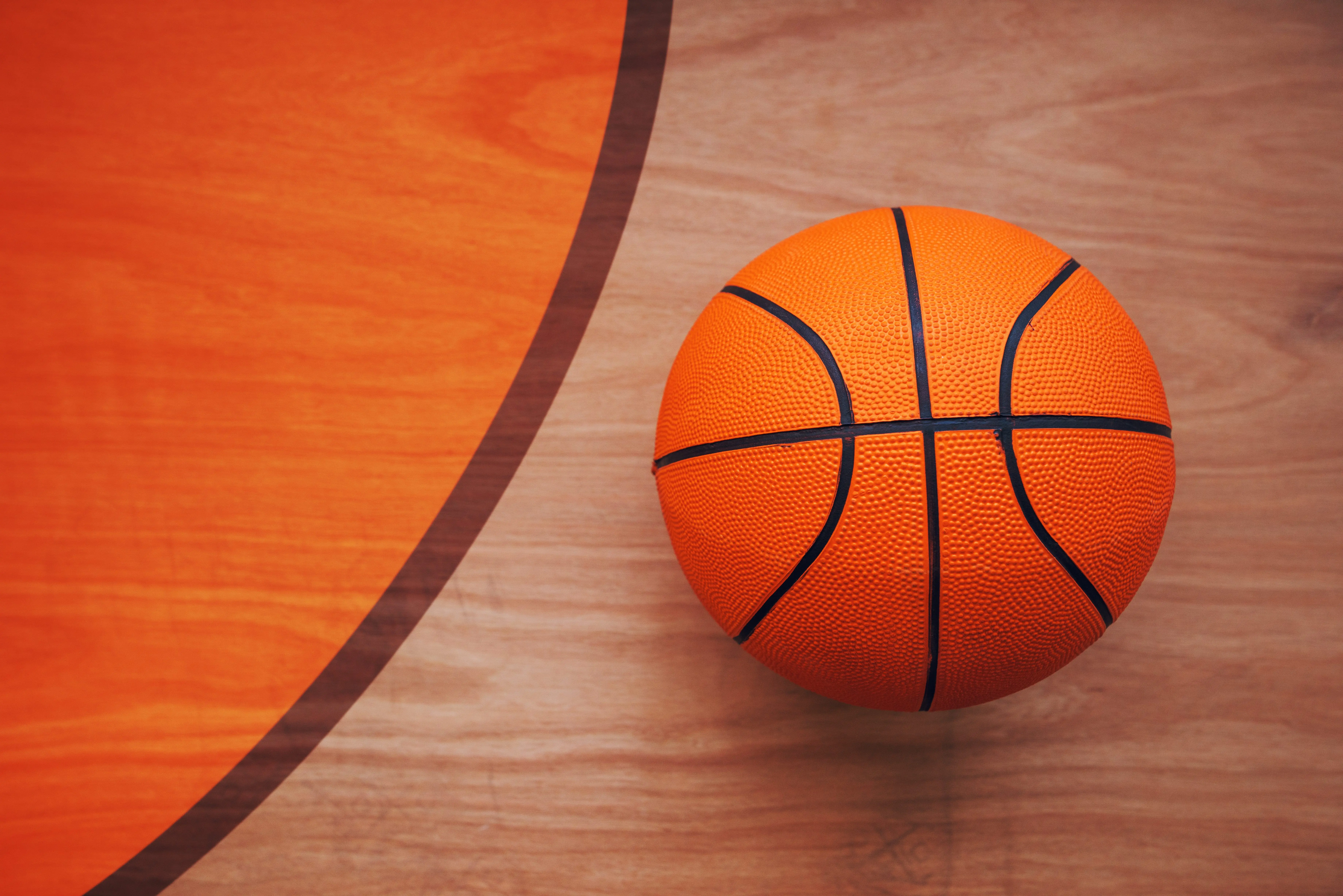 basketball-ball-on-court-floor