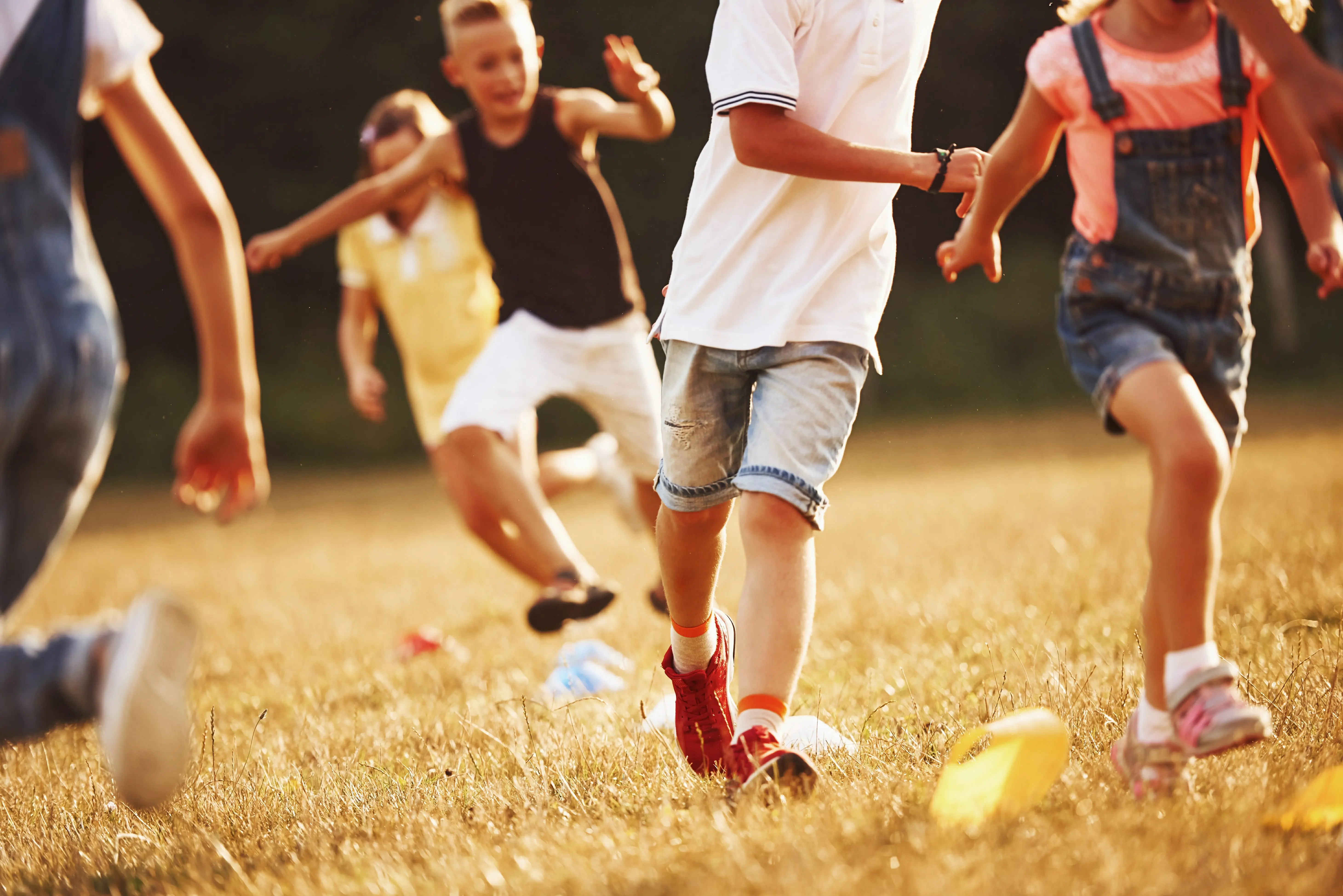 through-obstacles-kids-running-in-the-field-at-sunny-day-conception-of-healthy-lifestyle