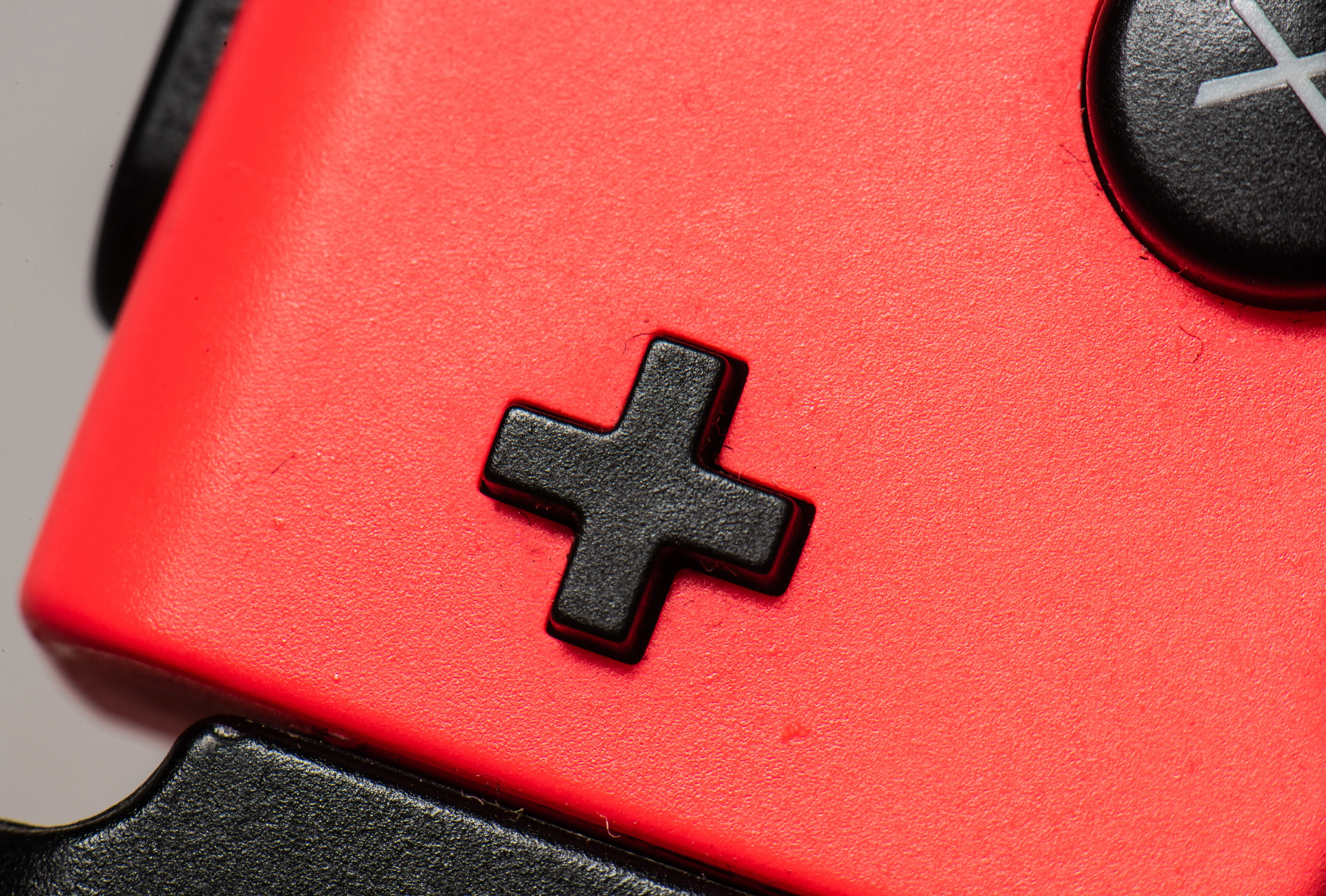 extreme-close-up-of-a-game-controller-2026-01-11-09-32-25-utc