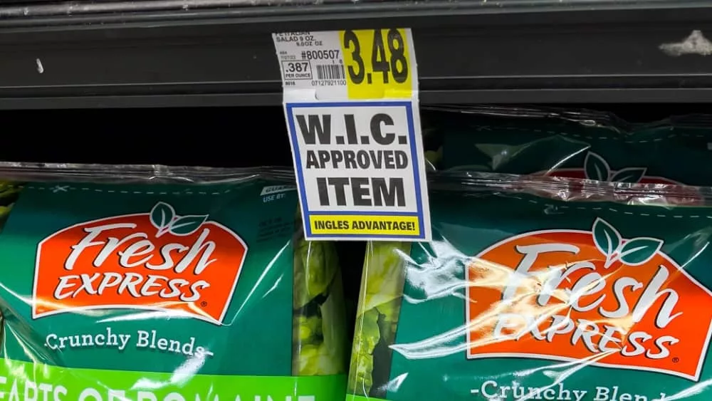 Fresh Express bagged lettuce on display at grocery store supermarket.