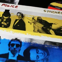 Closeup of The Police vinyl record album cover Synchronicity from 1983 (focus on center)