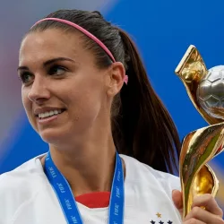Alex Morgan lifts the trophy after winning the 2019 FIFA Women's World Cup France Final match between The United State of America and The Netherlands at Stade de Lyon on July 7^ 2019 in Lyon^ France.