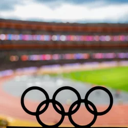 PARIS^ FRANCE^ JANUARY. 17. 2024: Paris 2024 Olympics Rings Cast a Striking Silhouette Over the Athletics Stadium