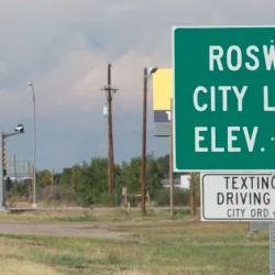 Highway sign for Roswell^ New Mexico