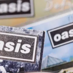 London^ UK - August 27 2024: Oasis band cds. Oasis are a popular rock band from the 1990's britpop era
