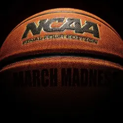 NCAA Final Four Edition March Madness basketball on dark background Wilmington^NC - USA - 05-07-2021