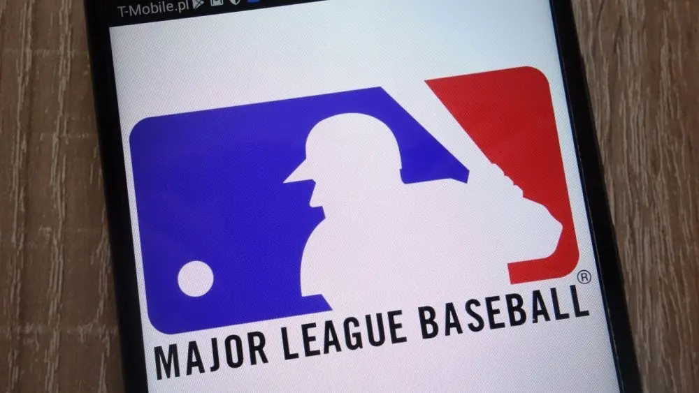 Major League Baseball logo displayed on a modern smartphone KONSKIE^ POLAND - SEPTEMBER 07^ 2018
