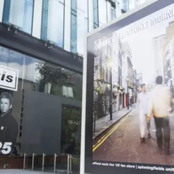 Oasis album cover artwork on display outside the Oasis live 25 shop in Manchester Manchester^ UK - 26 June 2025