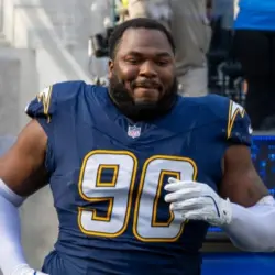 Los Angeles Chargers defensive lineman Teair Tart #90 runs into field before an NFL football game against the Houston Texans at SoFi Stadium^ Saturday Dec. 27^ 2025^ in Inglewood^ Calif.