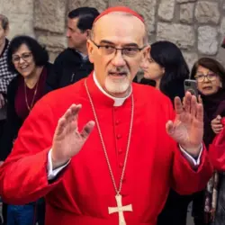 Cardinal Pierbattista Pizzaballa^ Latin Patriarch of Jerusalem^ greets the crowd as he leaves the Church of the Nativity after the Christmas celebrations. Bethlehem^ West Bank^ December 25^ 2025