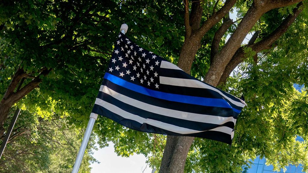 LAPD bans Thin Blue Line flag over complaint it represents 'racist, bigoted views'