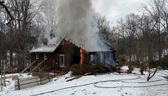 burning-home-in-whiteford-698e3f45b1b7b867643