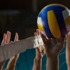 cropped-hands-of-players-practicing-volleyball