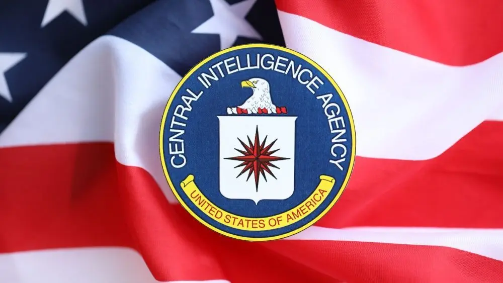 United States of America Central Intelligence Agency coat of arms sticker on folded US flag close up