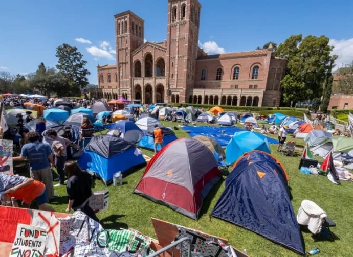 Pro-Palestinian protesters gathered at an encampment at the University of California^ Los Angeles (UCLA)^ on Friday^ April 26^ 2024^ in Los Angeles.