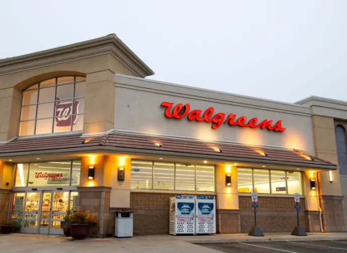 Walgreens Pharmacy store front^ sign^ logo entrance with drive thru. Santa Clarita^ CA^ USA: 2024 Sept. 14