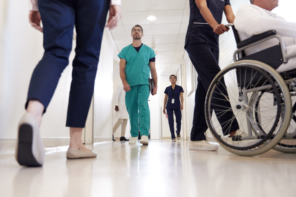 busy-hospital-corridor-with-medical-staff-and-patients