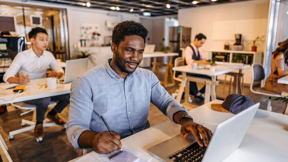 business-colleagues-working-at-modern-coworking-space