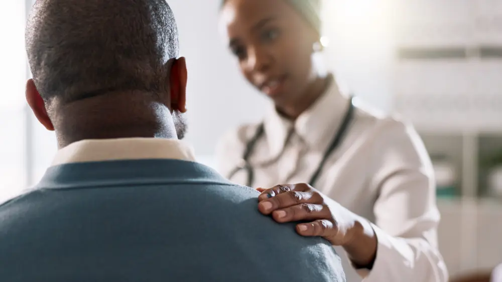 woman-doctor-or-consulting-with-patient-for-healthcare-appointment-or-checkup-at-hospital-female-person-medical-employee-or-worker-with-client-for-consultation-health-advice-or-service-at-clinic