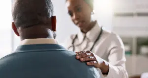 woman-doctor-or-consulting-with-patient-for-healthcare-appointment-or-checkup-at-hospital-female-person-medical-employee-or-worker-with-client-for-consultation-health-advice-or-service-at-clinic