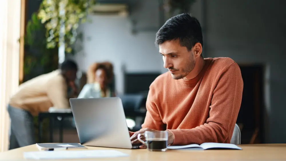 a-focused-businessman-working-on-his-computer