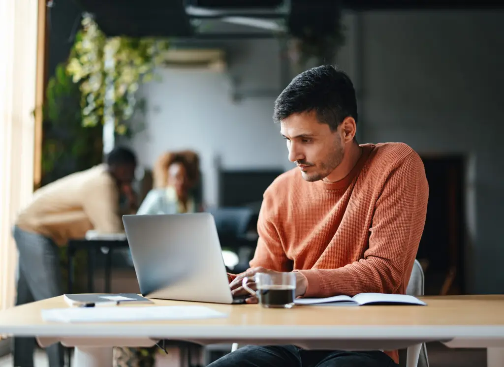 a-focused-businessman-working-on-his-computer